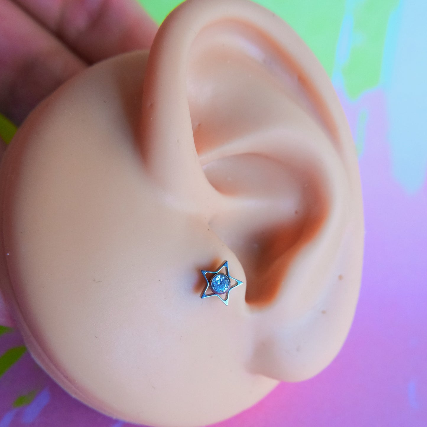 Titanium star with zircon internally threaded flatback