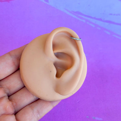 Titanium zircon hinged segment