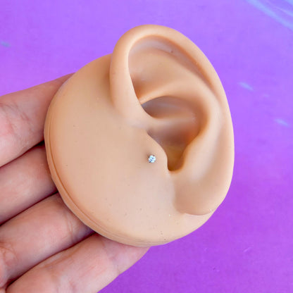 Titanium internally threaded flatback zircon