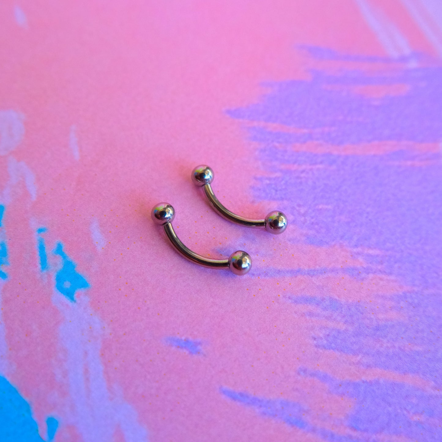 Titanium internally threaded curved barbell basic