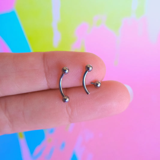 Titanium internally threaded curved barbell basic