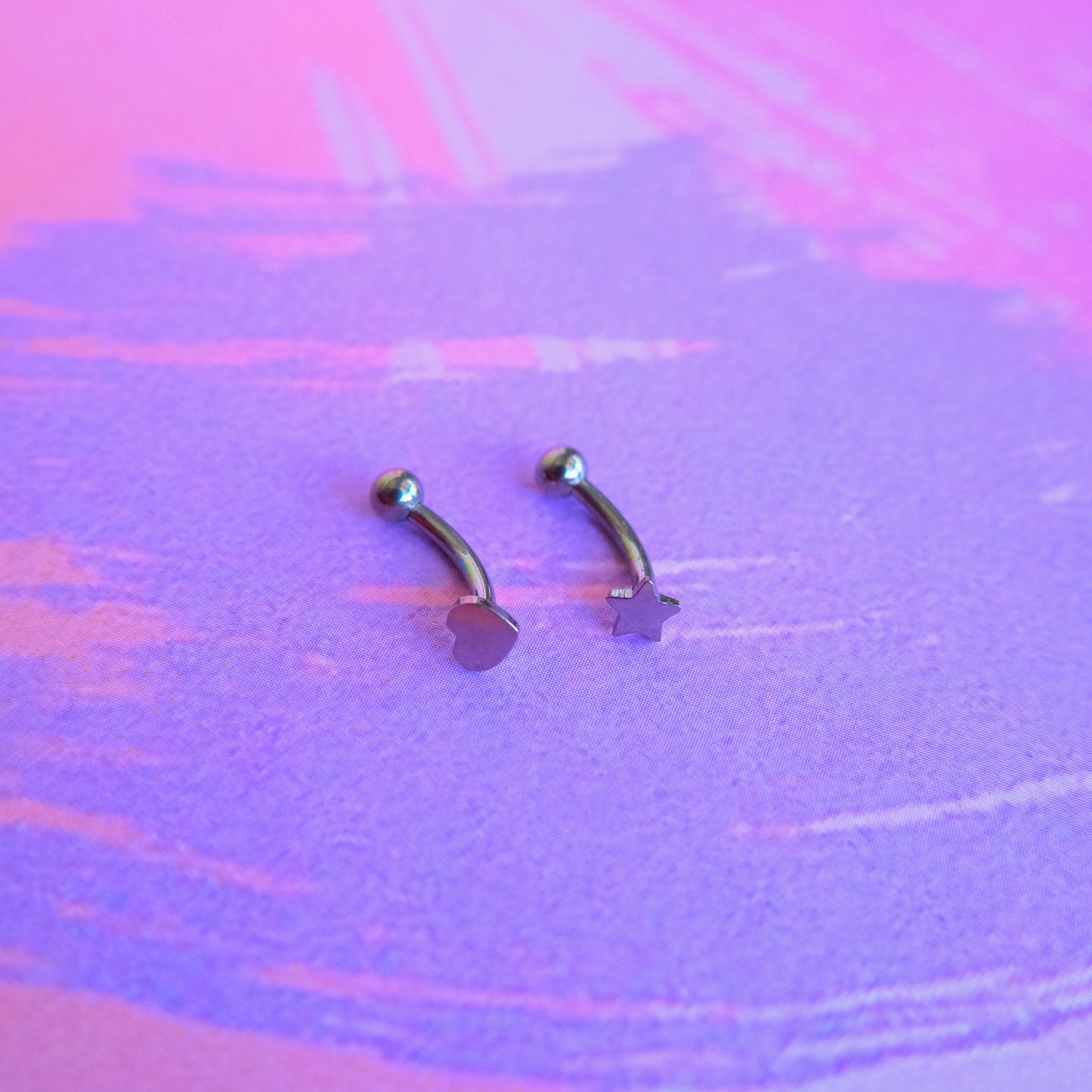 Titanium shapes internally threaded curved barbell