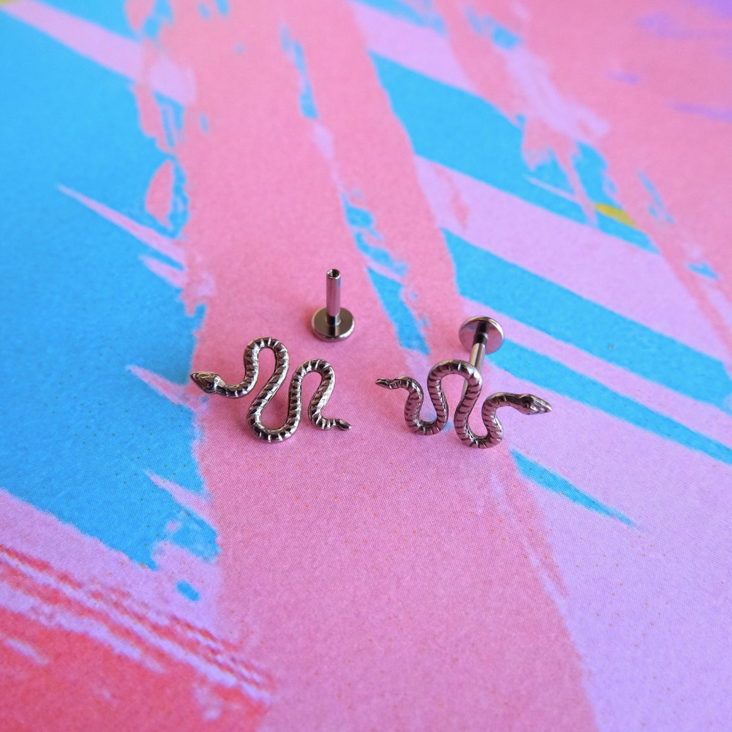 Titanium curved snake internally threaded flatback